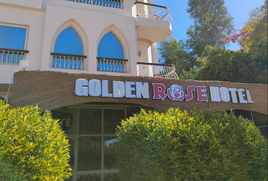 Golden Rose Hotel's entrance and signage.