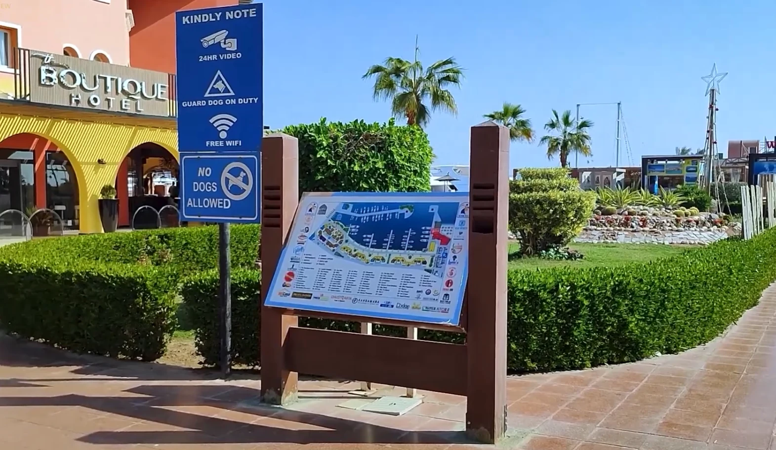 The marina's official visitor notice: CCTV, guard dog on duty, free WiFi and no personal dogs