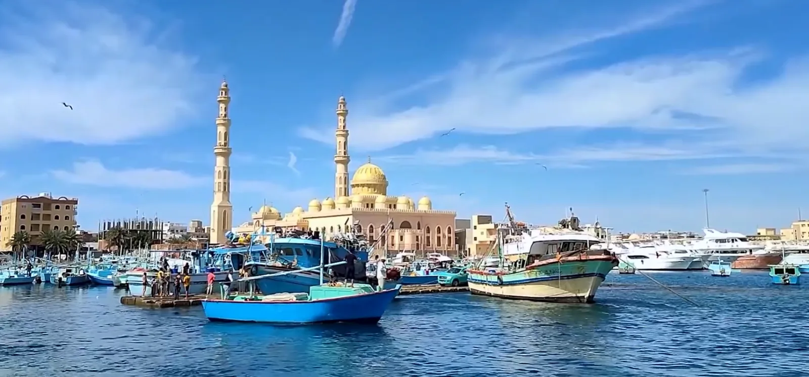 The harbour and mosque skyline seen from the water near Hurghada Marina.